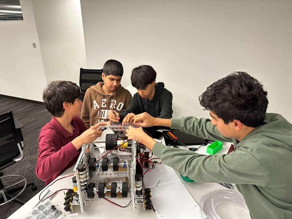 Students assembling the DECODE chassis